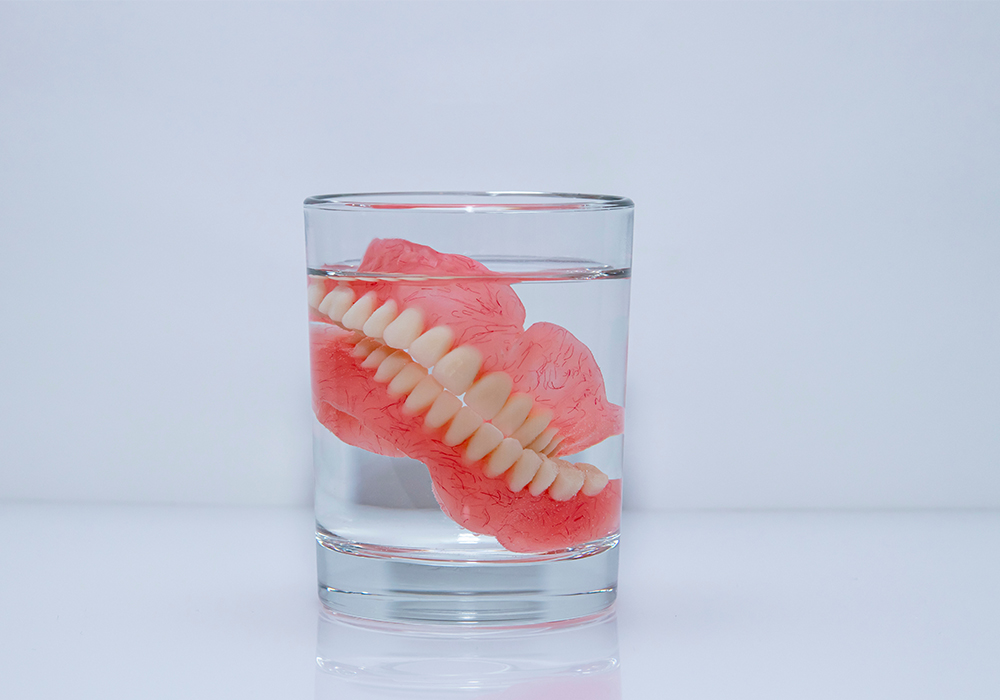 Dentures In Glass