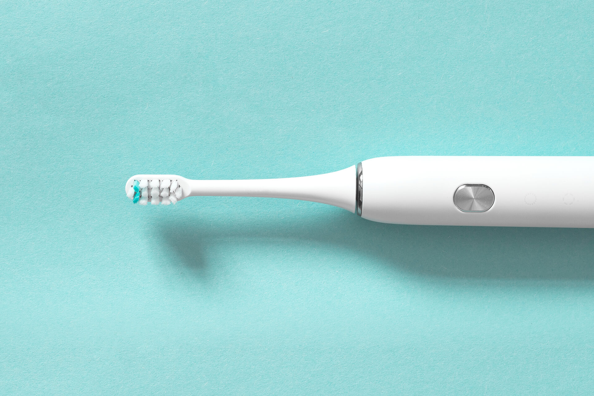 toothbrush on colored surface