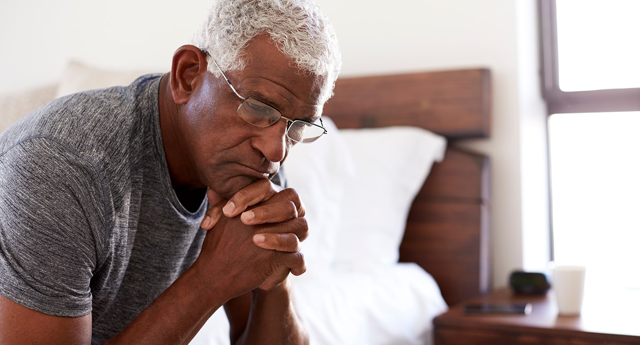 older black man looking concerned
