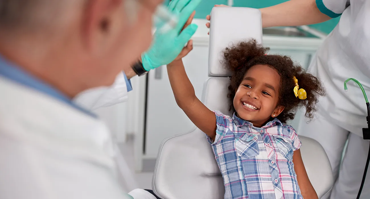 Young girl visiting the dentist for a dental checkup