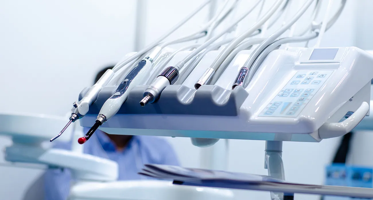 Dental tools arranged on a rack